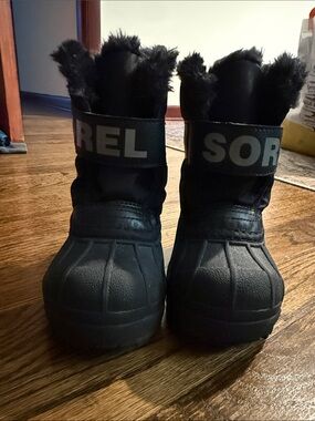 Sorel Black Kids Snow Boots with Faux Fur Collar